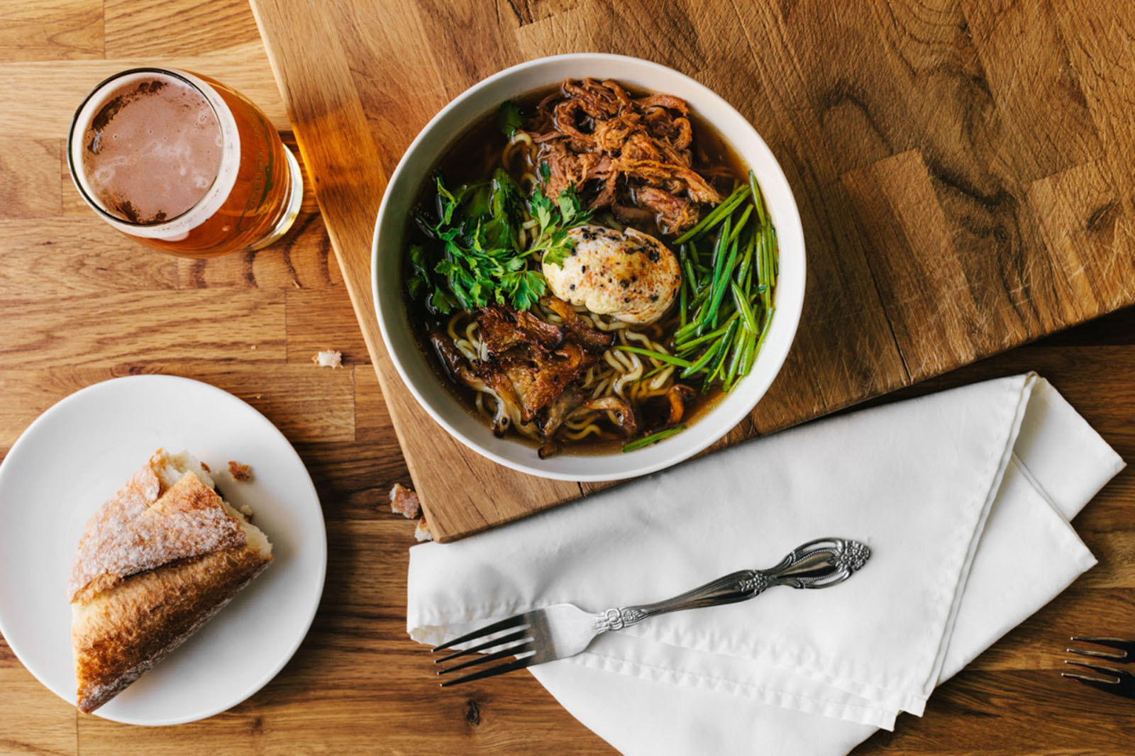 bowl of japanese food and beer